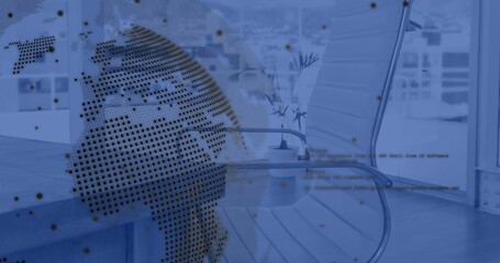 Dotted globe overlay occupying left side of office, with floor-to-ceiling windows, code, copy space