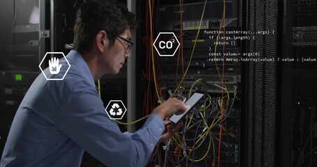Inspecting Korean man tapping tablet at data center server rack, with cables, eco icons, copy space