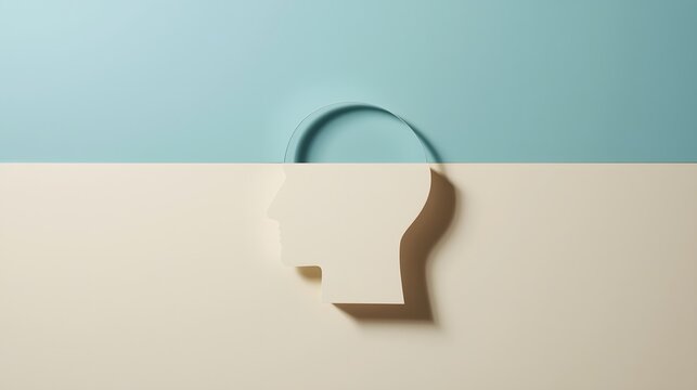 Minimalist concept of a human head silhouette cutout with a folded section revealing depth, placed on a two-tone beige and light blue background, symbolizing creativity, psychology, innovation, and me