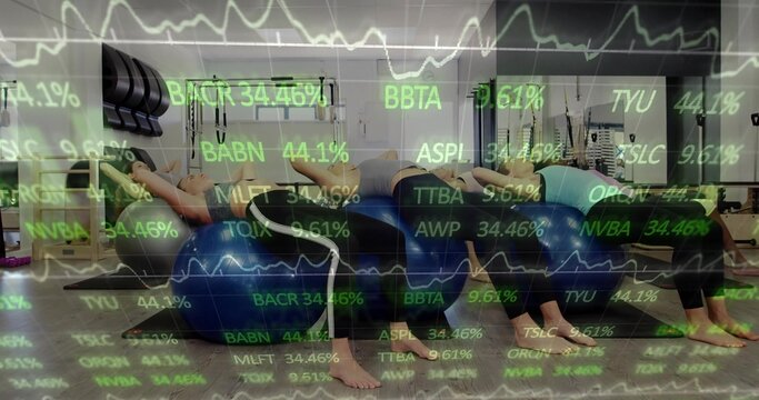 Performing bridge exercise five women on blue stability balls in fitness studio, with data overlay