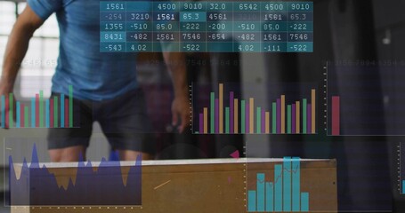 Pausing athlete wearing blue shirt black shorts behind plyometric box in gym, with digital overlays