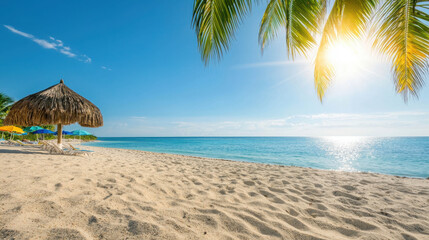 Fototapeta premium Serene Tropical Beach Scene with Thatched Umbrella and Palm Trees under a Clear Blue Sky and Bright Sunlight Reflecting on Calm Ocean Water