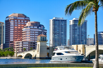 Luxury boat docked next to the Royal Park Drawbridge leading from downtown West Palm Beach to Palm Beach Island in Palm Beach County, Florida