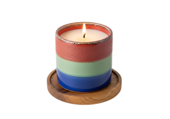 Lit colorful scented candle with a wooden coaster Isolated on transparent background