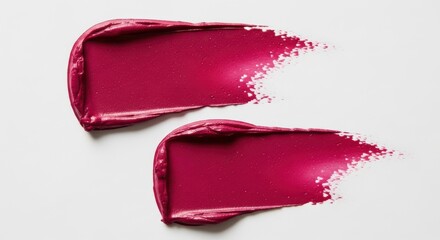 Two smears of vibrant berry lipstick isolated on white background, closeup