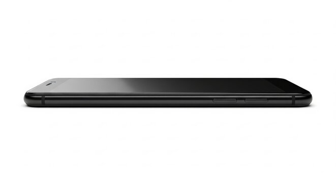 A sleek black smartphone lies flat on a white surface, showcasing its minimalist design and smooth lines, ideal for modern technology and mobile device illustrations .