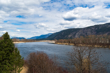 Early Spring Landscape with River and Partly Blue Sky in Clearwater Valley, British Columbia