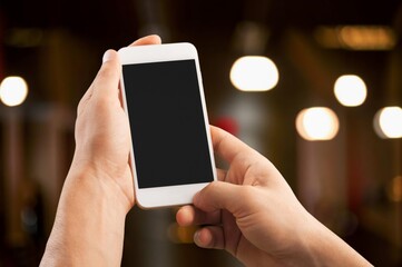 Hand typing on phone for social media