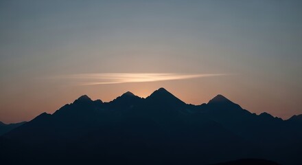 Silhouetted Mountain Range Under a Cloudy Sky at Sunset, Peacefu