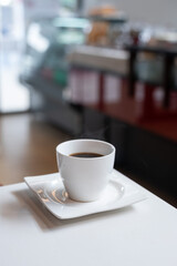 Coffee Cup on White Table