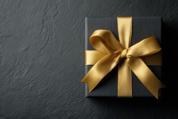 Elegant black gift box with gold ribbon (1)