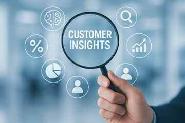 Customer insights concept with magnifying glass and business icons showing analysis and data