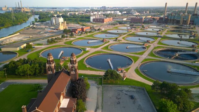 Aerial view of the historic church and waste water treatment plant in Detroit downtown industrial area.