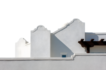 A minimalist architectural detail of a white stucco building, featuring decorative embellishments and a dark wooden pergola, sharply contrasted against a black background.
