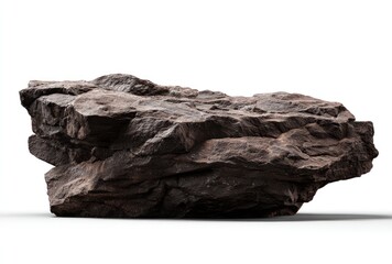 Obraz premium Brownish rock, with textured surfaces and sharp edges, lays isolated on a bright white surface with a soft shadow
