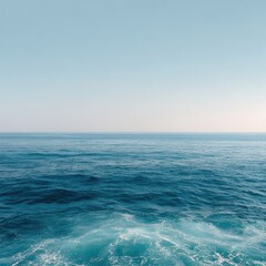 Fototapeta premium Calm ocean meeting clear sky (1)