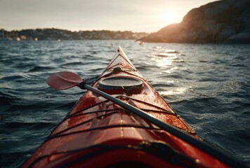 Kayak view Sunset gleams on distant shoreline. Paddle rests on red boat amidst rippling waters, basking in warm light