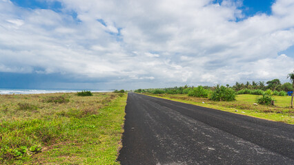 Beach road with beautiful blue sky.