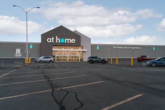New Hartford, New York - Aug 21, 2025: Evening wide view of At Home store, is a home decor superstore, recently acquired by private equity firm Hellman & Friedman
