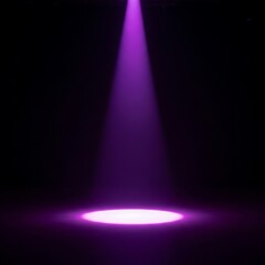 A spotlight illuminates a circular area of vibrant purple light on a dark surface, creating a dramatic and captivating scene.