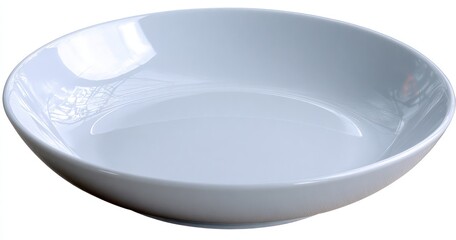 Clean, empty, white ceramic bowl sits isolated against a white background, catching the light softly
