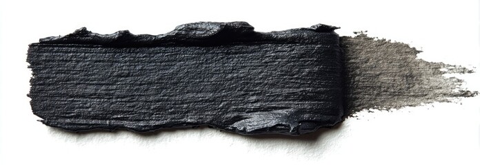 Dark, textured, cosmetic smear on white background