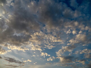 Dramatic Evening Clouds above Hanoi — Glowing Cumulus against Deep Blue Sky over West Lak