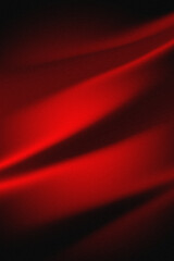 Abstract red light streaks on dark grainy background with copy space for modern poster design 