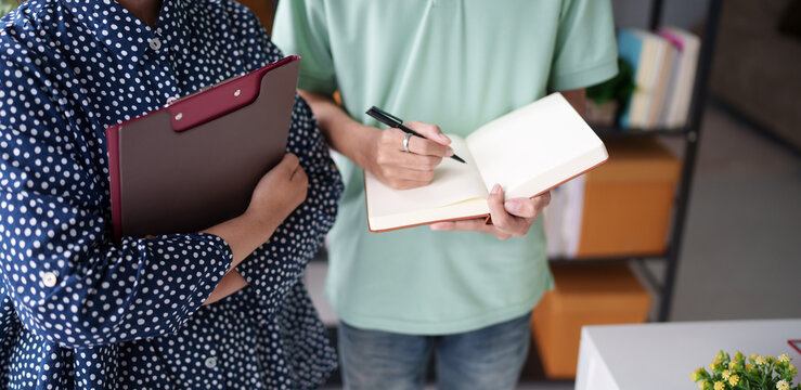 Teamwork brainstorming Creative idea Business project. Business People meeting taking notes while discussing with Color swatch samples to share idea.