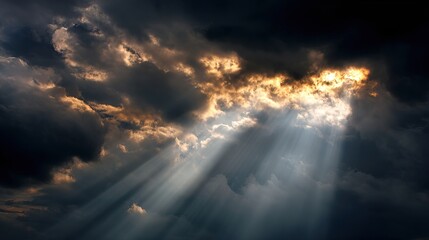 A dramatic sky filled with dark clouds and rays of light piercing through, creating a striking contrast and a sense of awe.
