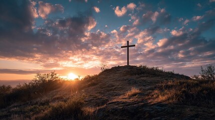 A serene sunset scene with a cross on a hill, symbolizing faith and tranquility amidst a beautiful sky and landscape.