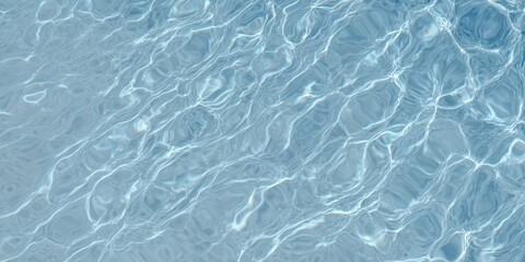 The serene water surface glistens with sunlight, creating an abstract and tranquil pattern.