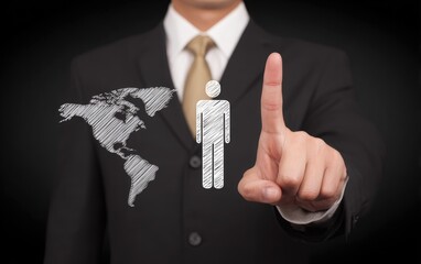 Businessman points at a person icon over a world map