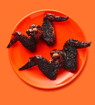 Blackened Bat Wings on Orange Plate