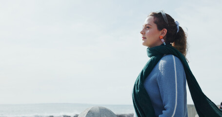 Blue sky, profile and vision with woman on beach for daydreaming, fresh air or planning outdoor. Relax, thinking and travel with person on space at coast for adventure, awareness or wellness