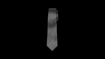 Elegant gray tie isolated on black background, perfect for formal occasions or adding a touch of sophistication