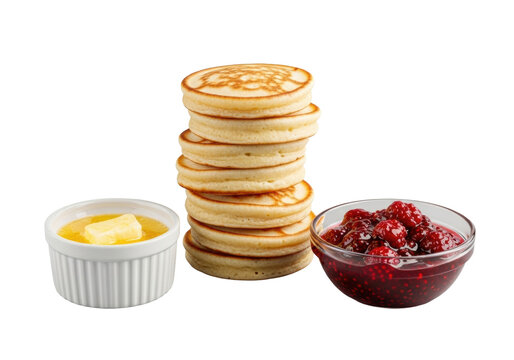 Tall stack of fluffy golden-brown blini with glistening melted butter and vibrant raspberry jam on a clean transparent studio background, soft diffused light, shallow depth of field, appetizing