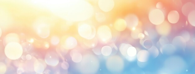 Obraz premium Dreamy bokeh background with a soft gradient blending from warm yellow and peach tones to cool blue hues