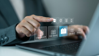 Hand interacting with digital education interface on laptop, e-learning platform, online courses, virtual library, academic resources, modern education technology and digital study systems.