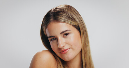 Portrait, woman and glow with skincare in studio for beauty, clear skin and natural shine. Female...