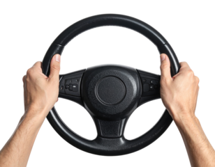 A pair of hands grips a car steering wheel, emphasizing control and focus while driving against a black background.