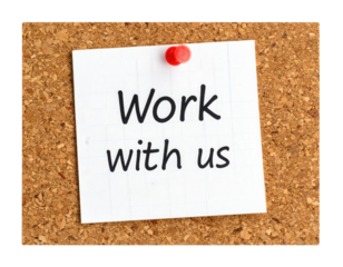 A pinned note with the text "Work with us" prominently displayed on a corkboard.
