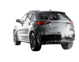 A sleek, modern SUV covered in suds, showcasing its design while being washed.