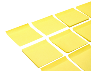 A collection of yellow sticky notes arranged in a grid pattern, showcasing their square shape and vibrant color.
