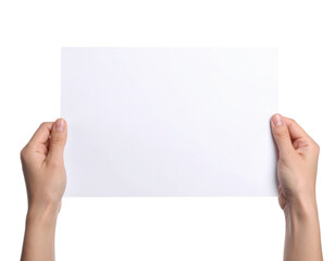 Obraz premium A pair of hands holding a blank sheet of white paper.