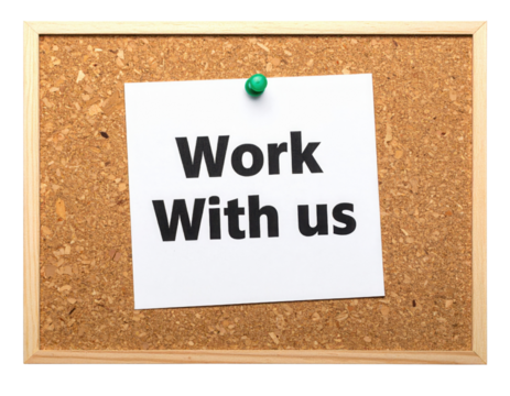 A corkboard displays a white paper with the bold text "Work With Us," secured by a green push pin.