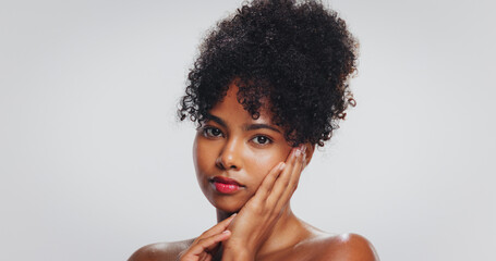 Hands, skincare and portrait of black woman in studio for dermatology, wellness and skin glow....