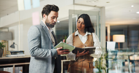 Business people, meeting and report with tablet in office for notebook, document feedback and schedule advice. Employees, digital tech and night for proposal planning, agenda or briefing conversation