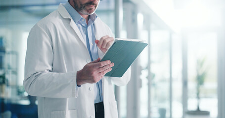 Hands, tablet and reading with doctor in hospital for healthcare report, research grant and...