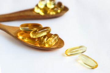 It's a spoonful of yellow softgel capsules. Many food supplements come in this form to enhance absorption by the body.